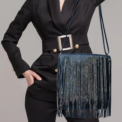 large black silver stripe leather crossbody bag with fringe. Fashion accessory for women in San Diego, CA.
