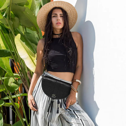 black print leather crossbody bag and fanny pack. Accessory for women in San Diego, CA.