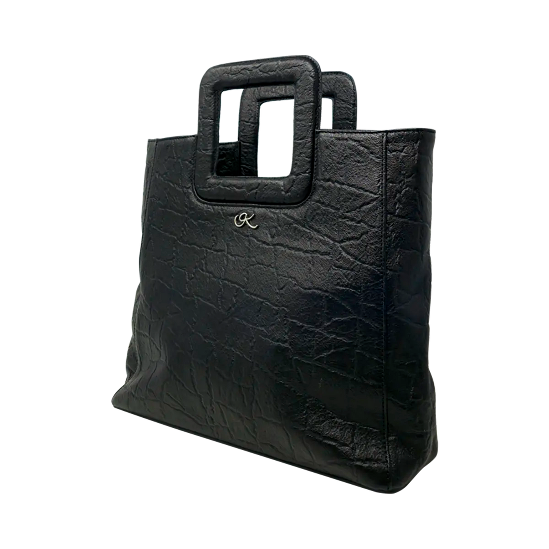 large black leather print handbag with a square handle. Accessory for women in San Diego, CA.