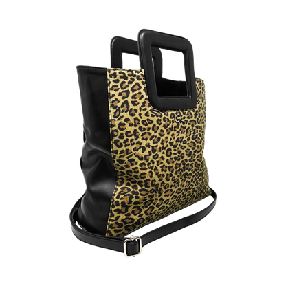 large black animal print leather print handbag with a square handle. Accessory for women in San Diego, CA.