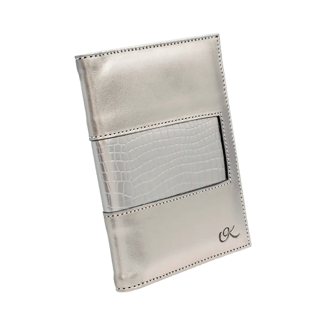 silver leather passport holder with detail print. Fashion travel accessory for women. Shop in San Diego, CA.